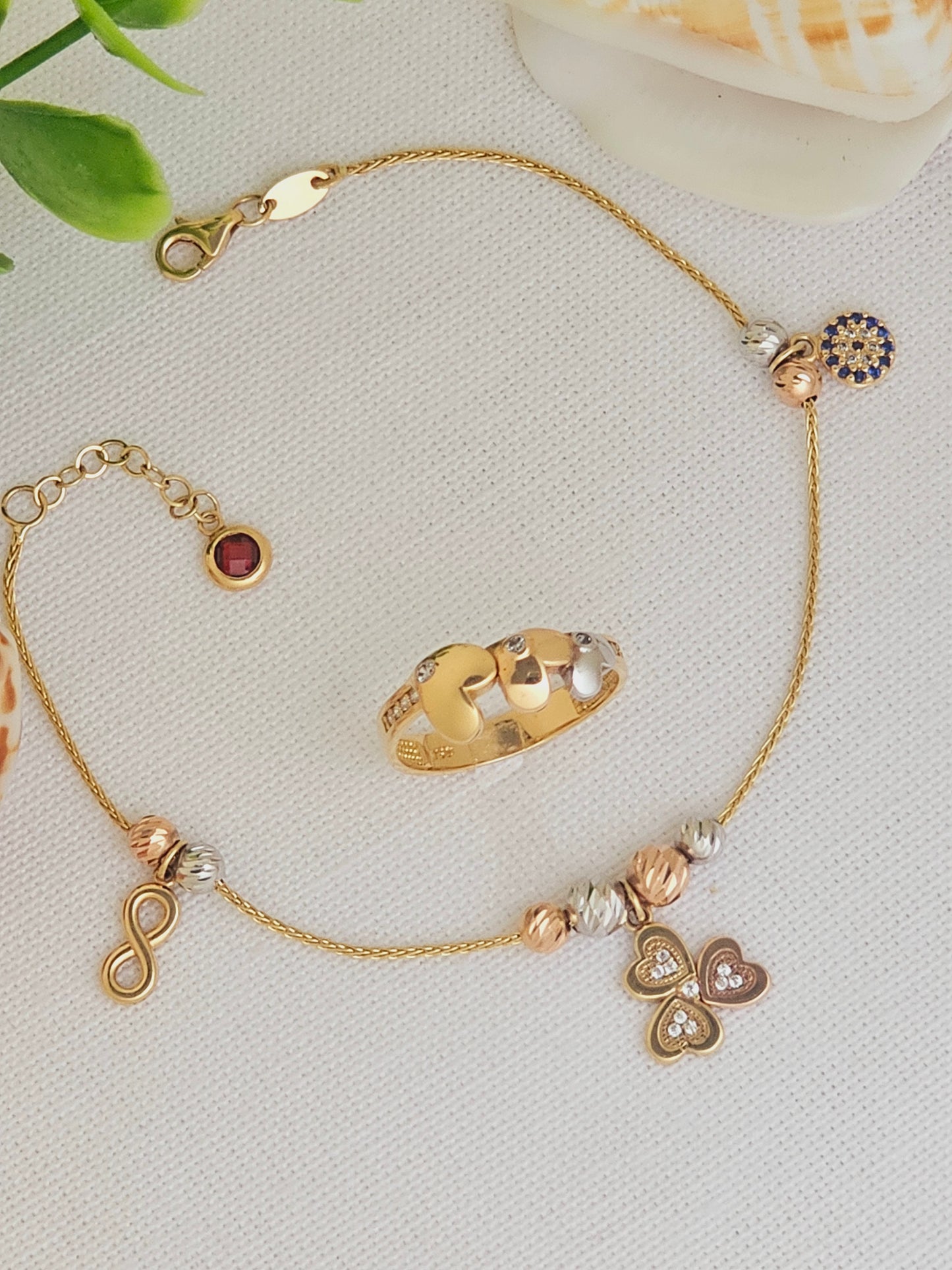 Pulsera de la suerte con trebol, Infinito y Ojo Turco en 3 tonos de Oro.