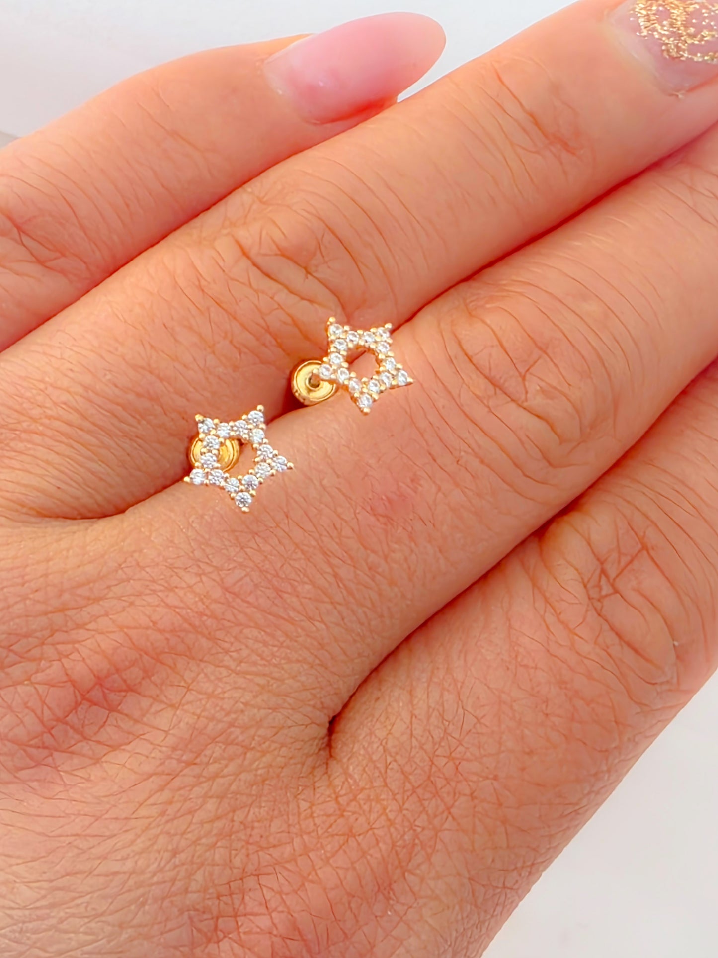 14K Gold Star Baby Earrings.