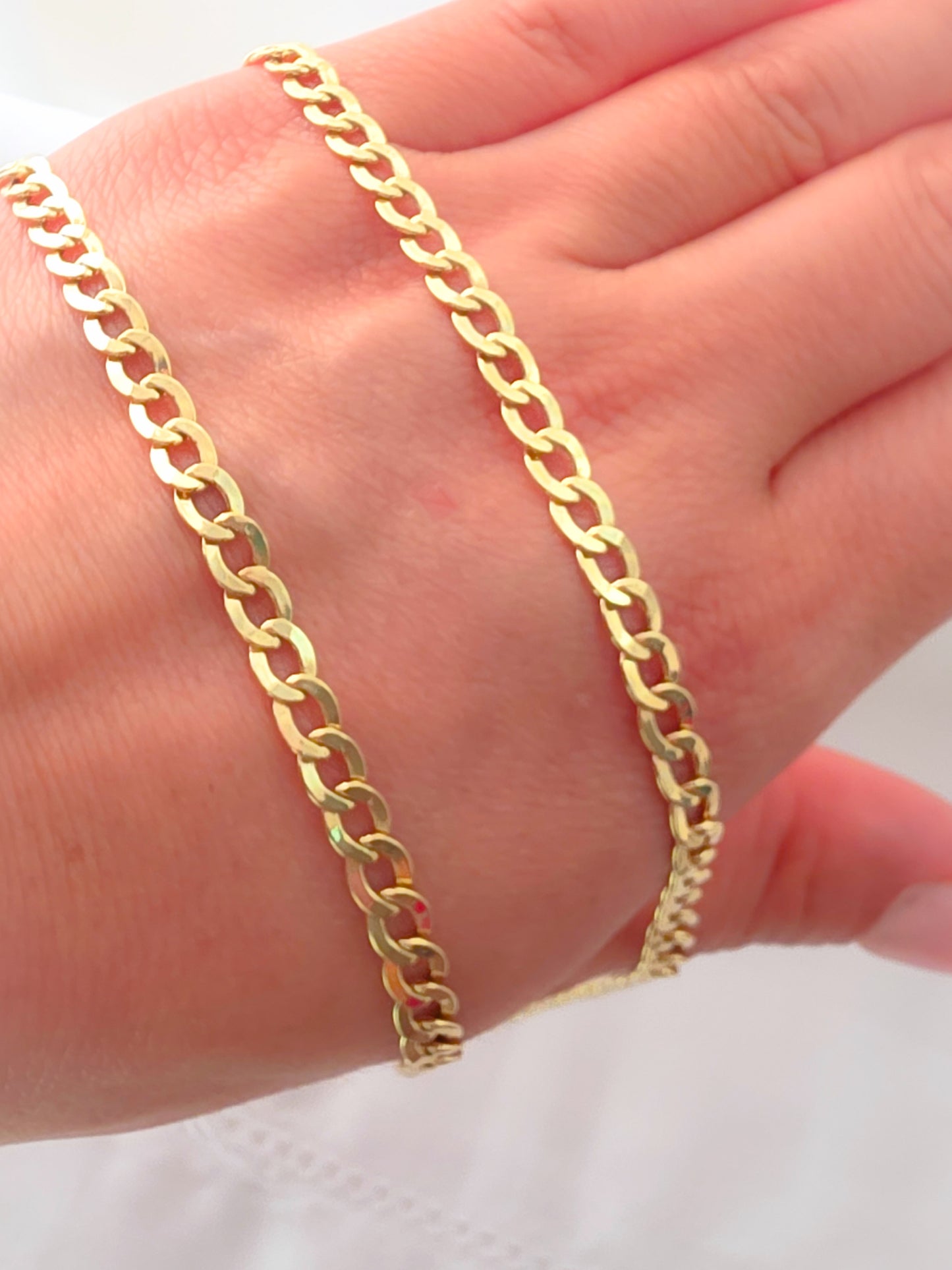 14k gold curb chain necklace.
