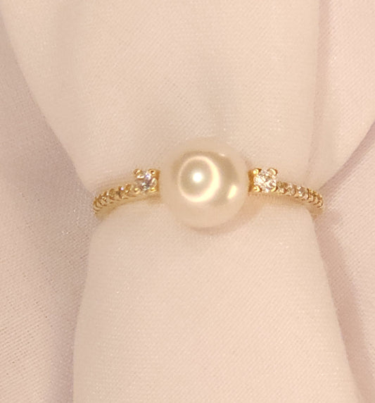 Gold Ring with Pearl and Crystal stones.