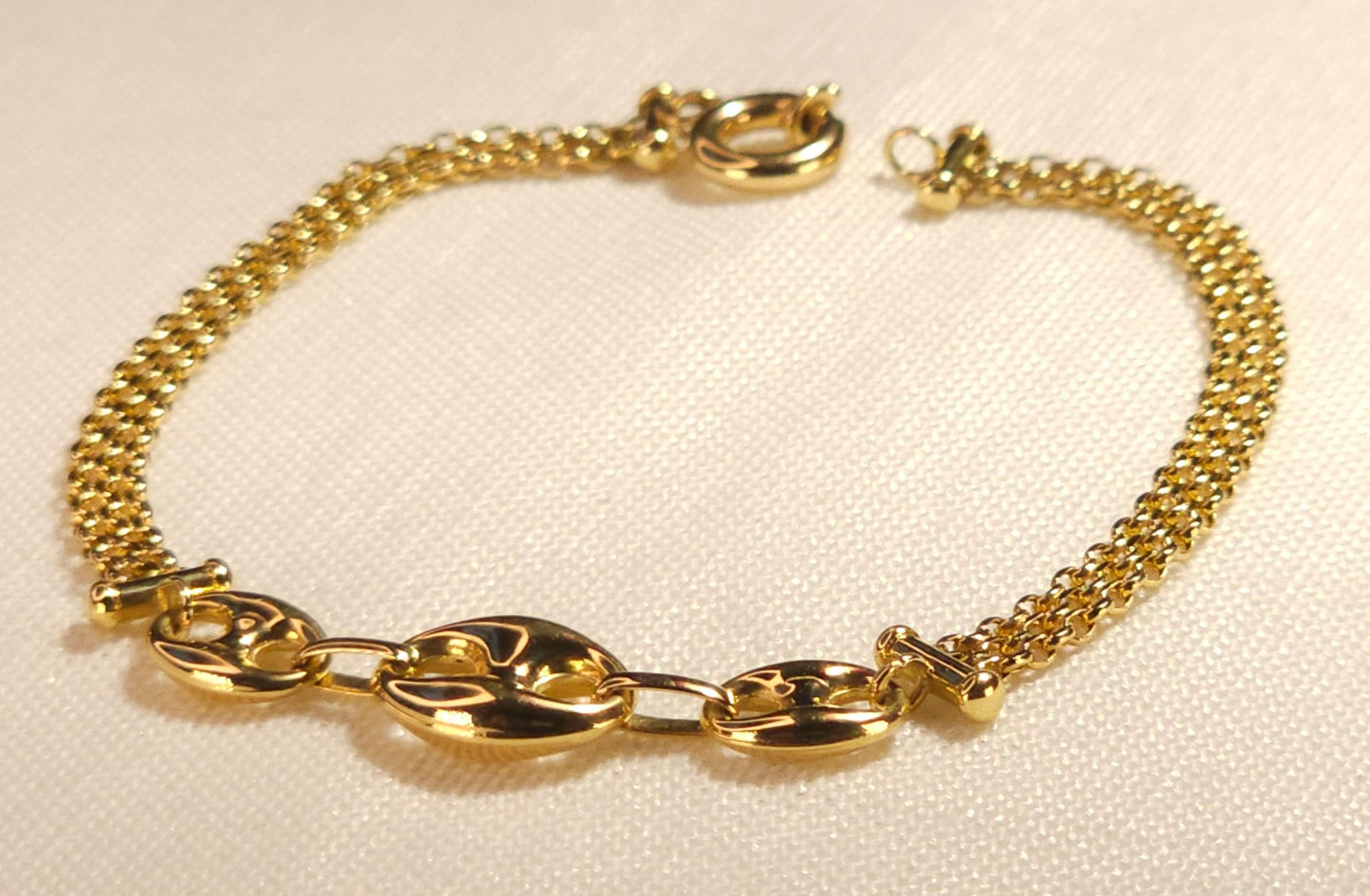 Bracelet correa con 3 botones.
