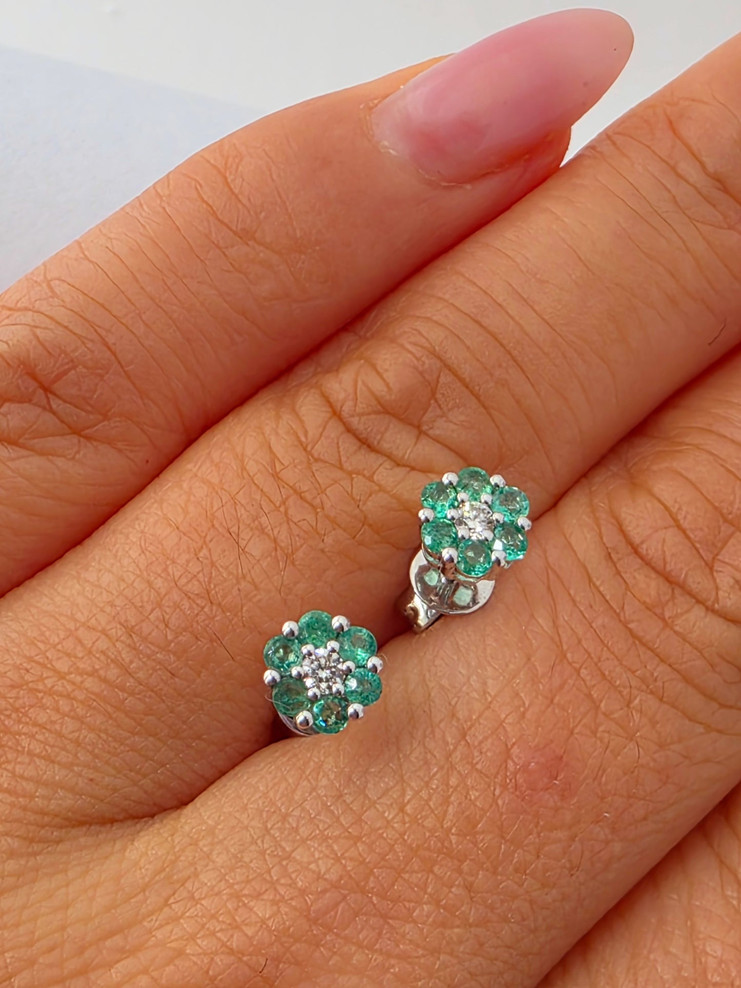 18K White Gold Emerald and Diamond Cluster Stud Earrings.